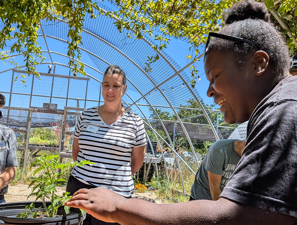 Jordan Taylor leading Tomato Care Workshop